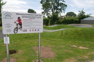 Photo of pump track and sign